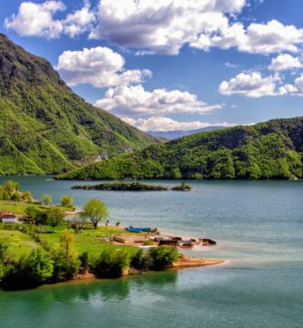 houses near body of water during daytime